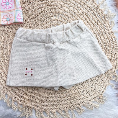  Conj. Blusa Florzinhas e Short Saia em Linho - Areia